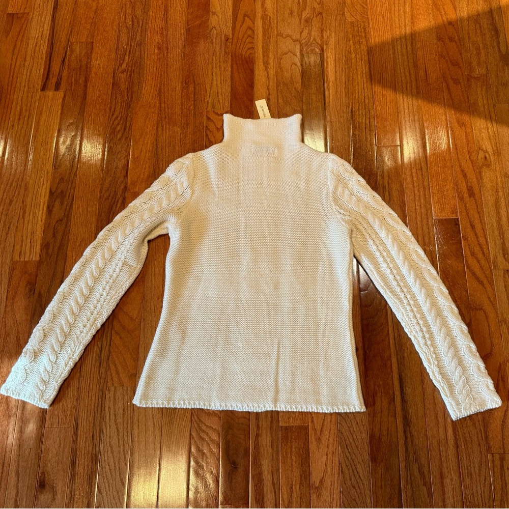 Ivory colored cable knit sweater